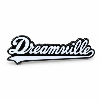 Dreamville enamel pin featuring the Dreamville logo design