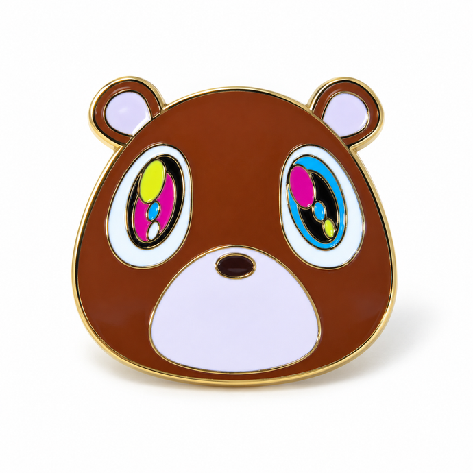 Graduation bear enamel pin with brown face and colorful eyes
