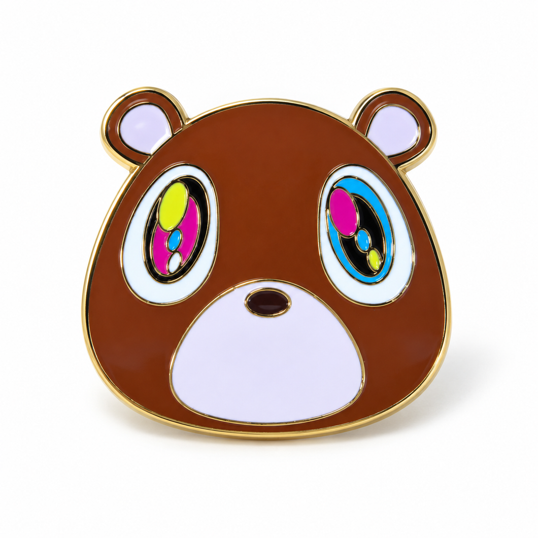 Graduation bear enamel pin with brown face and colorful eyes