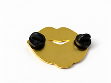 Back of Sabrina Carpenter Espresso enamel pin showing black pin posts