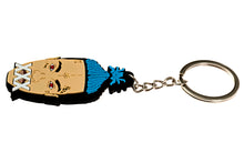 Angled view of XXXTentacion keychain showing raised rubber design