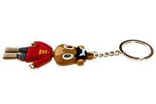 Full view of Kanye West TLOP bear keychain with metal chain and keyring